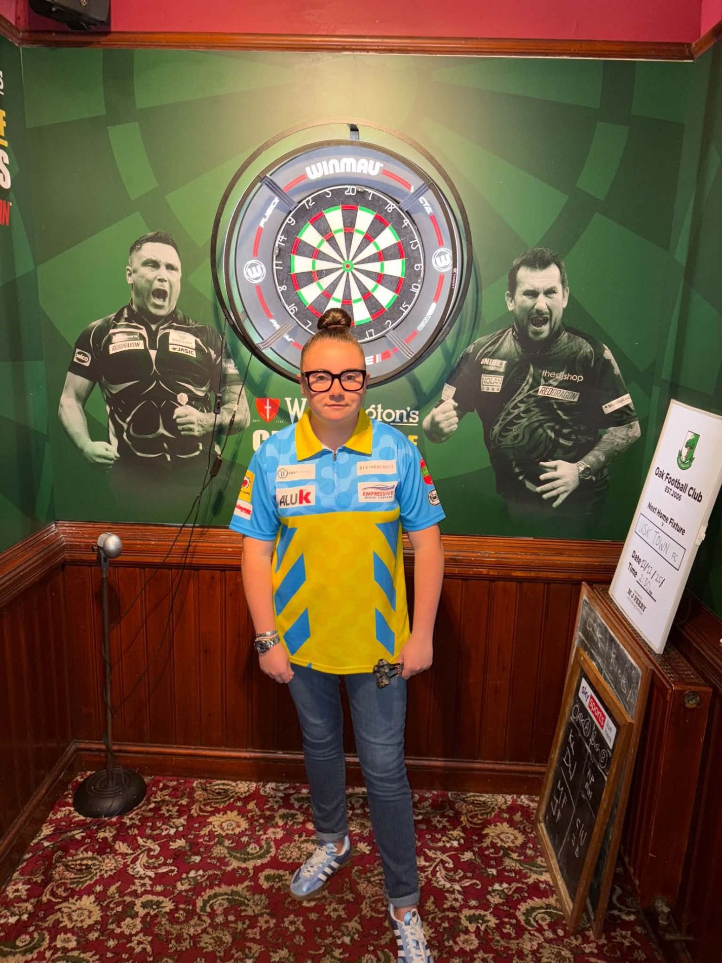talk training sponsors employee lauren harris's darts journey